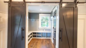 mud room with painted cabinets