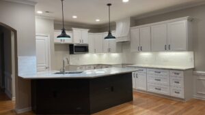 kitchen with white painted cabinets