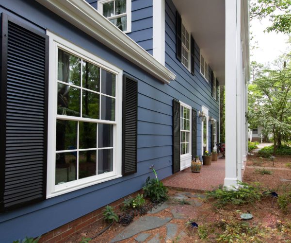 blue home with exterior painting